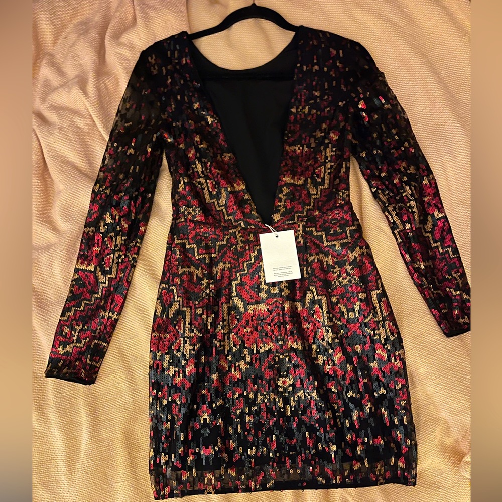 New tags still on XS deep back plunge line sequence dress
